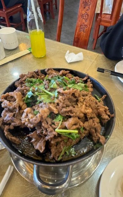 Beijing roast meat-Food Guide-Beijing Beijing roast meat at Kaorou Wan is sizzling and dripping with oil.