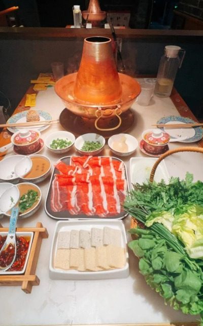 Jubaoyuan Restaurant-Food Guide-Beijing A table full of hearty, authentic Beijing dishes at Jubaoyuan Restaurant in Beijing.