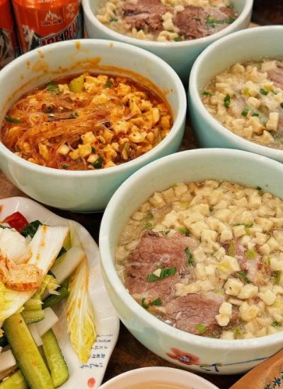 Lamb Paomo 1-Food Guide-Xi’an Lamb paomo is a signature dish in Xi'an cuisine, featuring tender lamb served with pieces of flatbread soaked in rich broth.