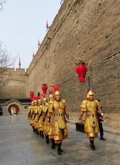 Performances at the Xi’an City Wall 4-Xi’an City Wall-Xi’an Performers dressed as ancient Chinese soldiers are patrolling the Xi'an City Wall.