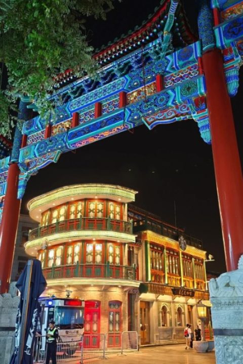 Qianmen Street-Food Guide-Beijing At night, the buildings behind Wupailou on Qianmen Street are all lit up.