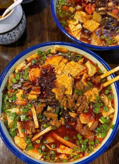 Saazi Noodles 1-Food Guide-Xi’an Saazi noodles are a traditional dish from Xi'an, featuring rich, savory toppings and colorful ingredients that make for a delightful and flavorful meal.