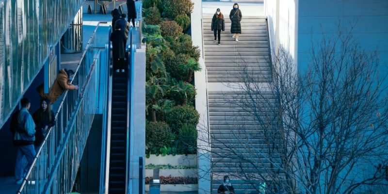 Stairs-Sanlitun-Beijing Tourists are walking down the stairs.