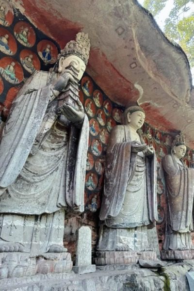 Three Holy Figures of Huayan-Dazu Rock Carvings-Chongqing The Three Holy Figures of Huayan at the Dazu Rock Carvings in Chongqing.