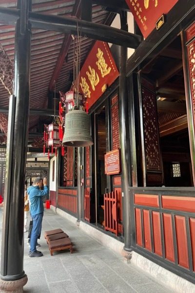 View 1-Wenshu Monastery-Chengdu Tours A visitor is paying their respects in front of the hall at Chengdu Wenshu Monastery.