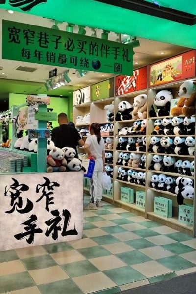 View 2-kuan zhai alley-Chengdu Tours A shop selling panda plush toys in Chengdu Kuan Zhai Alley.