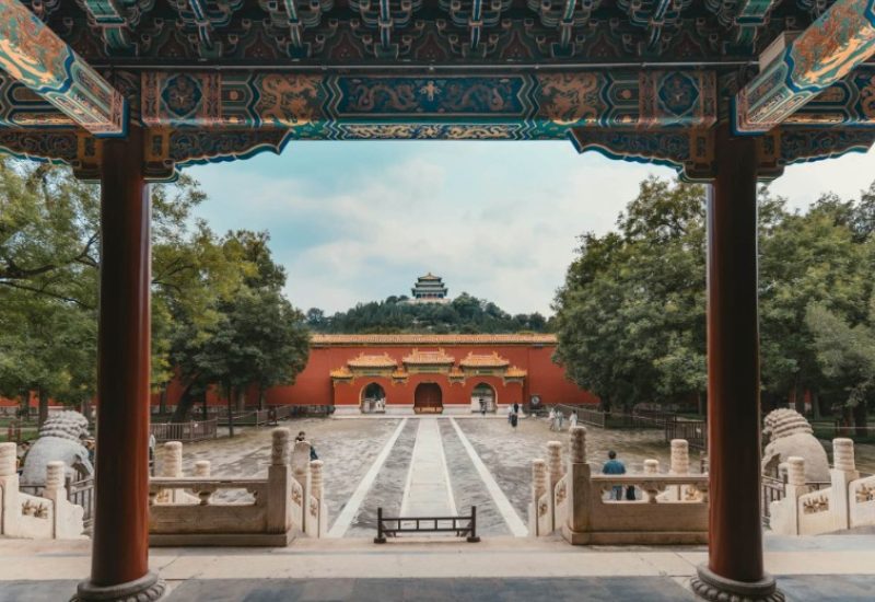 courtyard of the temple-JIngshan Park-Beijing The temple courtyard in Jingshan Park is very clean, beautifully complemented by the surrounding trees and red walls.