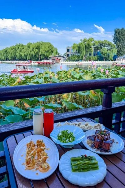 lotus-Shichahai-Beijing Having lunch by the lake covered in blooming lotus flowers.
