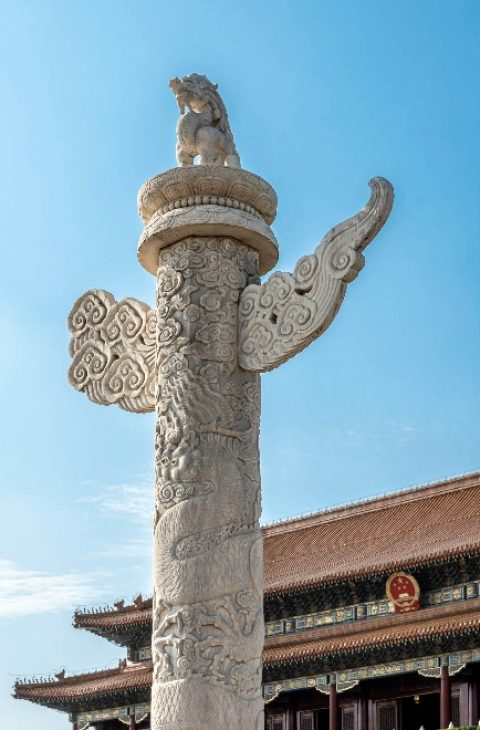 pillars-TIananmen-Beijing The pillars on Tiananmen Square, with a coiled dragon carved on the pillar body