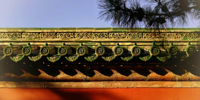 wall-Jingshan Park-Beijing The sunlight shines on the green eaves of Jingshan Park.